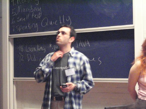 Lightning Talks - Amaretto Venture project - Michel Marquez with phone in hand